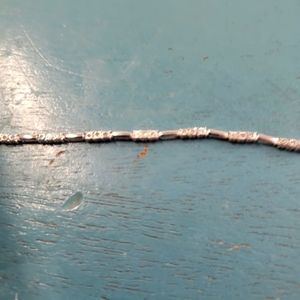 Peoples white gold and diamond bracelet